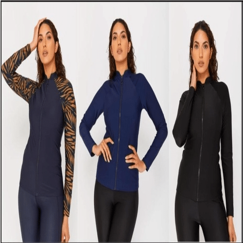 Woman wearing stylish swim separates while relaxing at the beach.